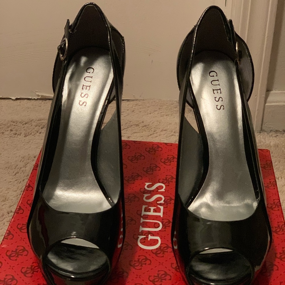 Guess worn patent platform heels